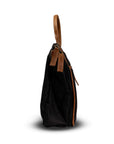 Black handbag with a brown handle on a white background